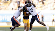 Nov 1, 2025; Berkeley, California, USA; Virginia Cavaliers linebacker Kam Robinson (5) intercepts a pass intended or California Golden Bears tight end Mason Mini (85) during the fourth quarter at California Memorial Stadium. Mandatory Credit: D. Ross Cameron-Imagn Images