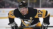Feb 23, 2025; Pittsburgh, Pennsylvania, USA;  Pittsburgh Penguins center Sidney Crosby (87) prepares for a face-off against the New York Rangers during the first period at PPG Paints Arena.