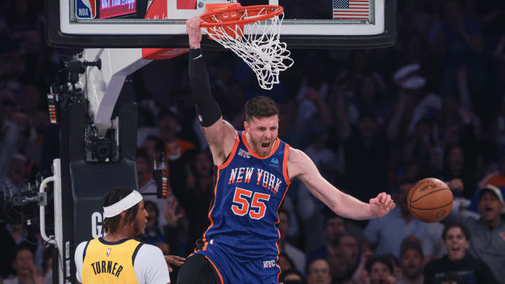 May 14, 2024; New York, New York, USA; New York Knicks center Isaiah Hartenstein (55) reacts after dunking the ball against Indiana Pacers center Myles Turner (33) during game five of the second round for the 2024 NBA playoffs at Madison Square Garden. Mandatory Credit: Vincent Carchietta-USA TODAY Sports