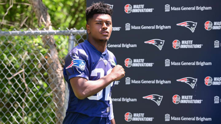 Jun 10, 2024; Foxborough, MA, USA; New England Patriots safety Jaylinn Hawkins (32) walks to the practice fields for minicamp at Gillette Stadium. Mandatory Credit: Eric Canha-USA TODAY Sports