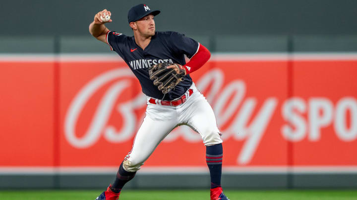 Jul 22, 2024; Minneapolis, Minnesota, USA; Minnesota Twins second baseman Brooks Lee (72) throws the ball to first base for an out against the Philadelphia Phillies in the fifth inning at Target Field. Mandatory Credit: Jesse Johnson-USA TODAY Sports