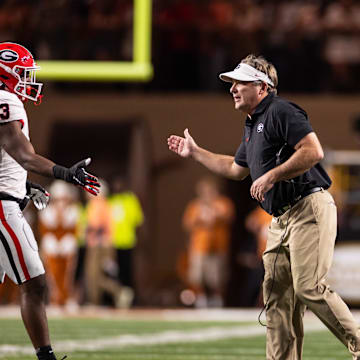 Oct 19, 2024; Austin, Texas, USA; Georgia Bulldogs head coach Kirby Smart celebrates with his players during the second quarter against the Texas Longhorns at Darrell K Royal-Texas Memorial Stadium. Mandatory Credit: Brett Patzke-Imagn Images