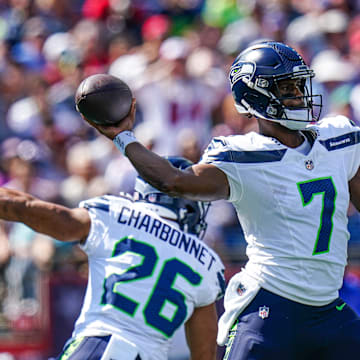 Sep 15, 2024; Foxborough, Massachusetts, USA; Seattle Seahawks quarterback Geno Smith (7) throws a pass against the New England Patriots in the first quarter at Gillette Stadium. Mandatory Credit: David Butler II-Imagn Images