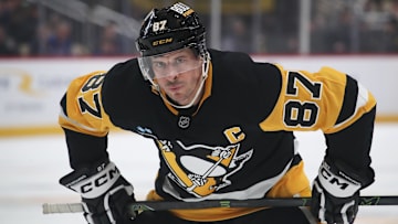 Feb 23, 2025; Pittsburgh, Pennsylvania, USA;  Pittsburgh Penguins center Sidney Crosby (87) prepares for a face-off against the New York Rangers during the first period at PPG Paints Arena. Mandatory Credit: Charles LeClaire-Imagn Images