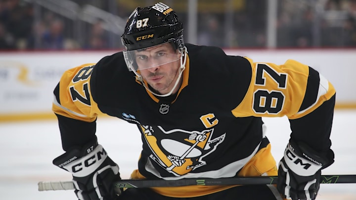Feb 23, 2025; Pittsburgh, Pennsylvania, USA;  Pittsburgh Penguins center Sidney Crosby (87) prepares for a face-off against the New York Rangers during the first period at PPG Paints Arena. Mandatory Credit: Charles LeClaire-Imagn Images