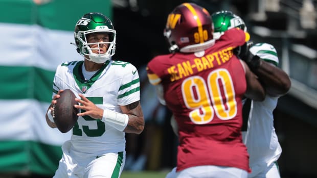 New York Jets quarterback Adrian Martinez (15) drops back to pass during the second half