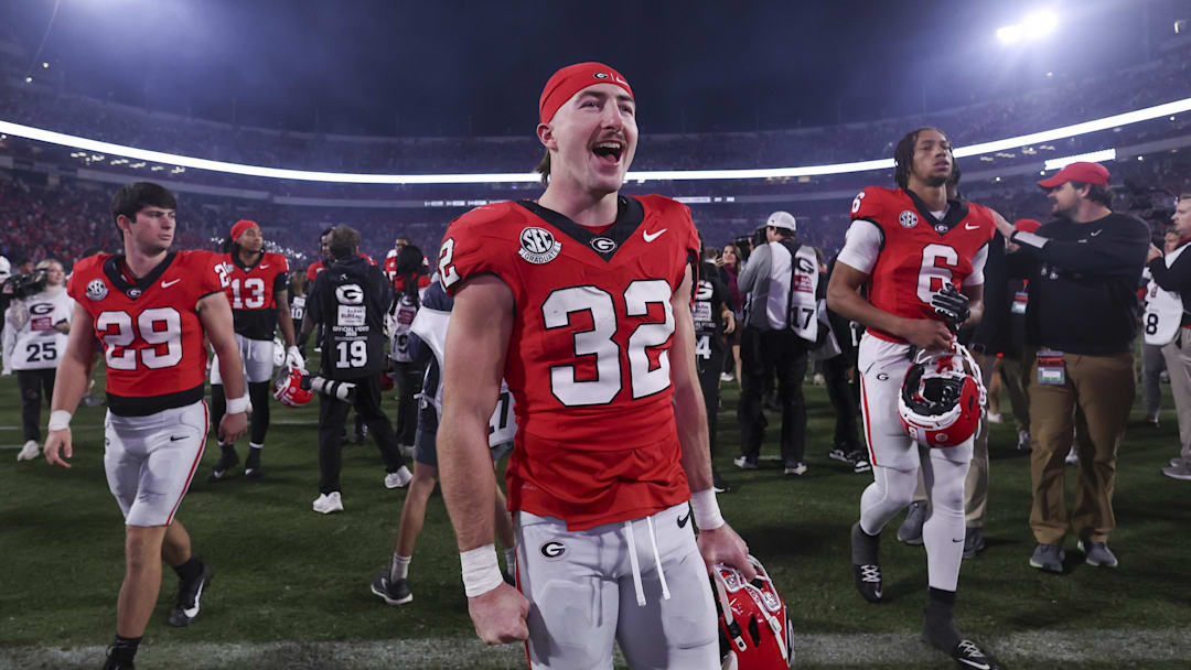 Nov 15, 2025; Athens, Georgia, USA; Georgia Bulldogs running back Cash Jones (32) celebrates after a game against the Texas Longhorns at Sanford Stadium. Mandatory Credit: Brett Davis-Imagn Images