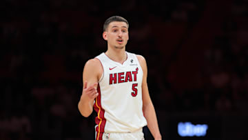 Oct 6, 2025; Miami, Florida, USA; Miami Heat forward Nikola Jovic (5) talks to his teammates against the Milwaukee Bucks during the second quarter at Kaseya Center. Mandatory Credit: Sam Navarro-Imagn Images