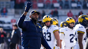 Michigan head coach Sherrone Moore watches warmups before the game between Ohio State and Michigan at Ohio Stadium in Columbus, Ohio on Saturday, Nov. 30, 2024.