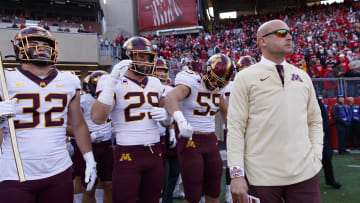 Minnesota coach P.J. Fleck stands before taking the field prior to the game against Wisconsin at Camp Randall Stadium in Madison, Wis., on Nov. 26, 2022.