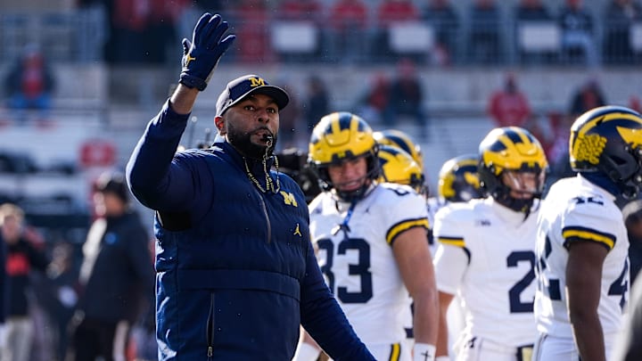 Michigan head coach Sherrone Moore watches warmups before the game between Ohio State and Michigan at Ohio Stadium in Columbus, Ohio on Saturday, Nov. 30, 2024.