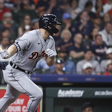 Apr 5, 2023; Houston, Texas, USA; Detroit Tigers left fielder Austin Meadows (17) hits an RBI single during the eighth inning against the Houston Astros at Minute Maid Park. 