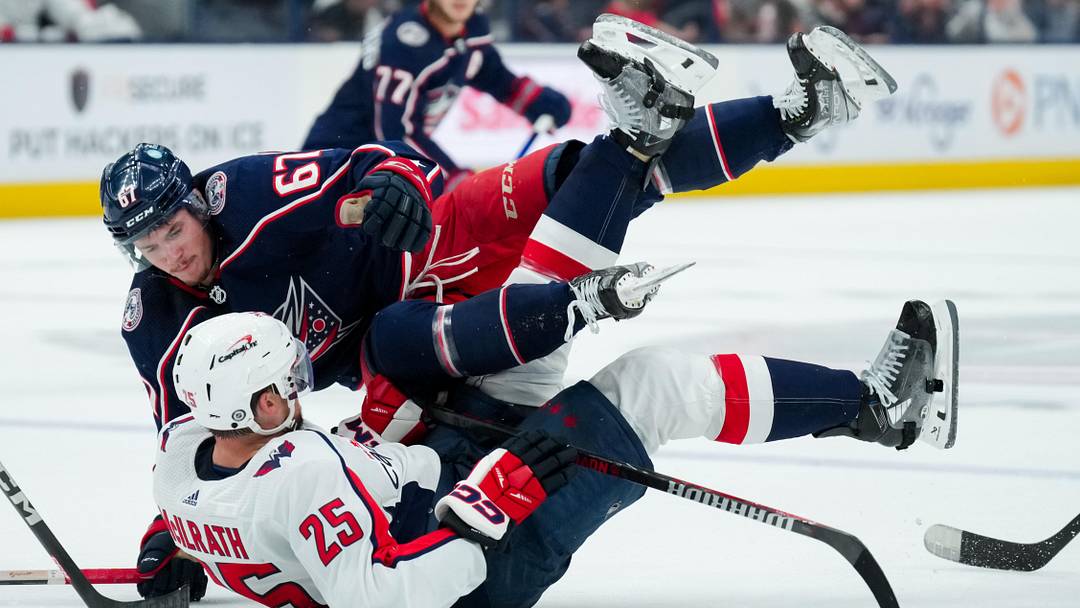 Oct 5, 2023; Columbus, Ohio, USA; Columbus Blue Jackets left wing James Malatesta (67) checks Washington Capitals defenseman Dylan McIlrath (25) in the second period at Nationwide Arena. Mandatory Credit: Aaron Doster-Imagn Images Oct 5, 2023; Columbus, Ohio, USA; Columbus Blue Jackets left wing James Malatesta (67) checks Washington Capitals defenseman Dylan McIlrath (25) in the second period at Nationwide Arena. Mandatory Credit: Aaron Doster-Imagn Images
