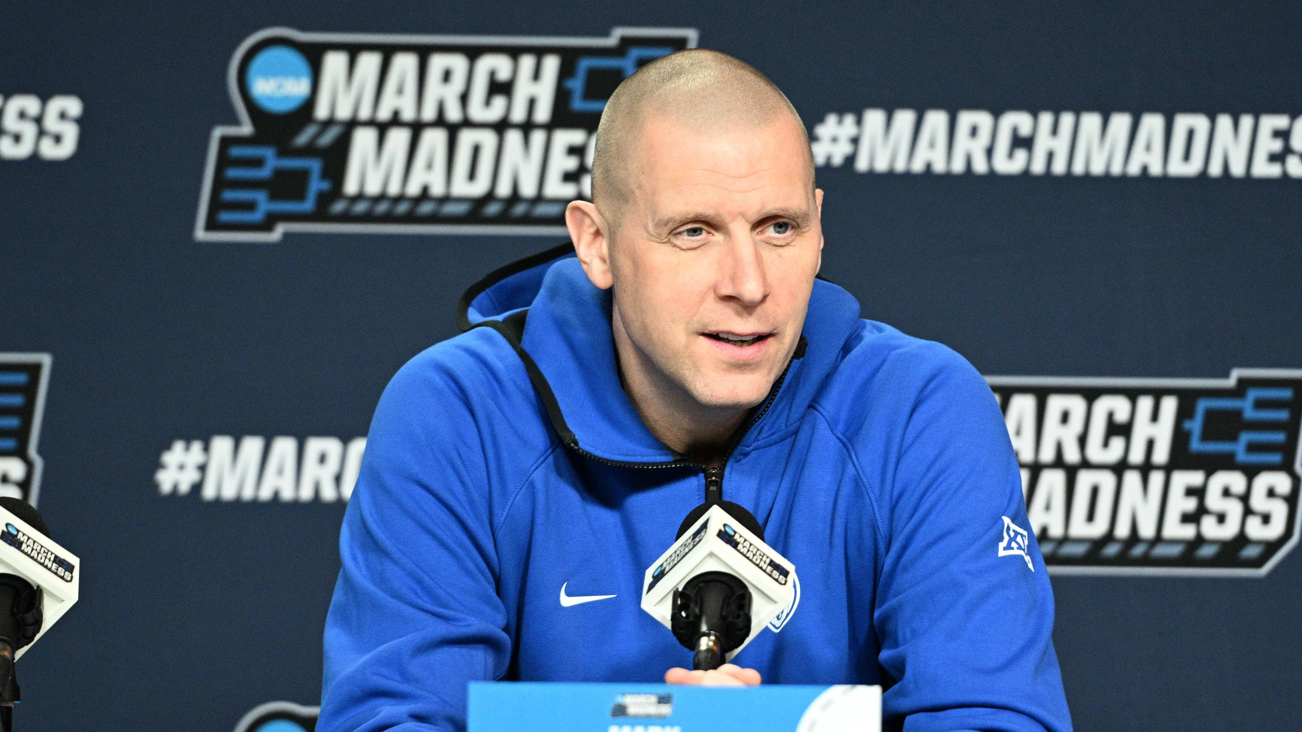 Mar 20, 2024; Omaha, NE, USA;  Brigham Young Cougars head coach Mark Pope talks with the media