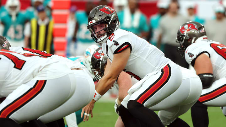 Aug 23, 2024; Tampa, Florida, USA;  Tampa Bay Buccaneer quarterback Baker Mayfield (6) calls a play against the Miami Dolphins during the first quarter at Raymond James Stadium. Mandatory Credit: Kim Klement Neitzel-USA TODAY Sports