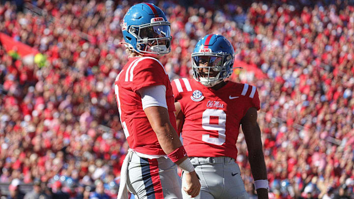 Sep 7, 2024; Oxford, Mississippi, USA; Mississippi Rebels quarterback Jaxson Dart (2) and Mississippi Rebels wide receiver Tre Harris (9) react after a touchdown during the first half against the Middle Tennessee Blue Raiders at Vaught-Hemingway Stadium. Mandatory Credit: Petre Thomas-Imagn Images