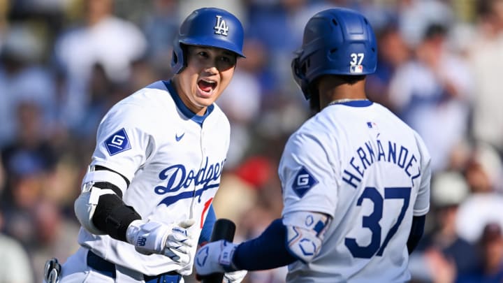 Jul 21, 2024; Los Angeles, California, USA; Los Angeles Dodgers designated hitter Shohei Ohtani (17) celebrates with Los Angeles Dodgers outfielder Teoscar Hernández (37) after hitting a solo home run against the Boston Red Sox during the fifth inning at Dodger Stadium. Mandatory Credit: Jonathan Hui-USA TODAY Sports