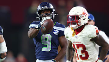 Sep 25, 2025; Glendale, Arizona, USA; Seattle Seahawks running back Kenneth Walker III (9) reacts in the first half against the Arizona Cardinals at State Farm Stadium. Mandatory Credit: Mark J. Rebilas-Imagn Images