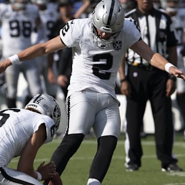 Sep 15, 2024; Baltimore, Maryland, USA; Las Vegas Raiders place kicker Daniel Carlson (2) kicks a game winning field goal  during the second half against the Baltimore Ravens at M&T Bank Stadium. Mandatory Credit: Tommy Gilligan-Imagn Images