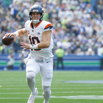 Sep 8, 2024; Seattle, Washington, USA; Denver Broncos quarterback Bo Nix (10) passes against the Seattle Seahawks during the first quarter at Lumen Field. 