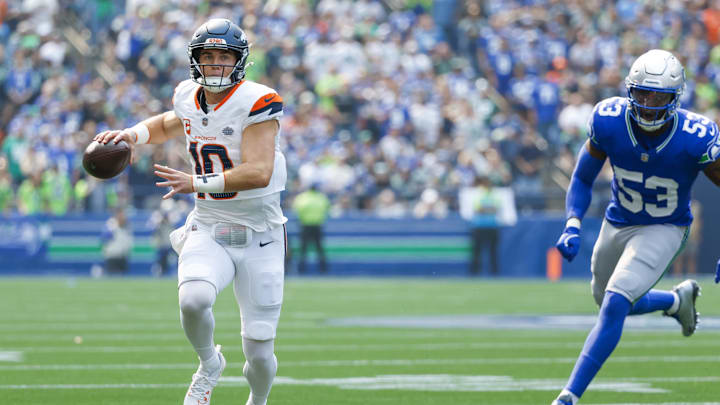 Sep 8, 2024; Seattle, Washington, USA; Denver Broncos quarterback Bo Nix (10) passes against the Seattle Seahawks during the first quarter at Lumen Field. 