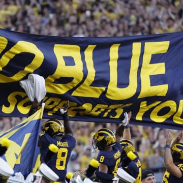 Aug 31, 2024; Ann Arbor, Michigan, USA;  Michigan Wolverines players take the field before a game against the Fresno State Bulldogs at Michigan Stadium. Mandatory Credit: Rick Osentoski-USA TODAY Sports