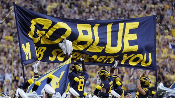 Aug 31, 2024; Ann Arbor, Michigan, USA;  Michigan Wolverines players take the field before a game against the Fresno State Bulldogs at Michigan Stadium. Mandatory Credit: Rick Osentoski-USA TODAY Sports