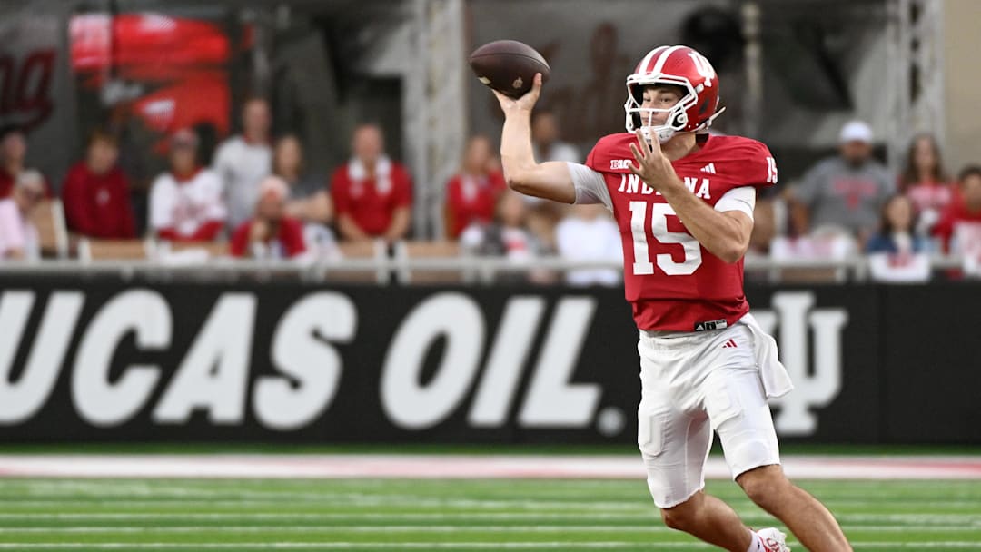 Oct 18, 2025; Bloomington, Indiana, USA; Indiana Hoosiers quarterback Fernando Mendoza (15) throws a pass during the second half against the Michigan State Spartans at Memorial Stadium. Mandatory Credit: Robert Goddin-Imagn Images