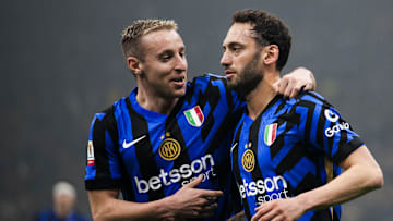 Hakan Calhanoglu (R) of FC Internazionale celebrates with...