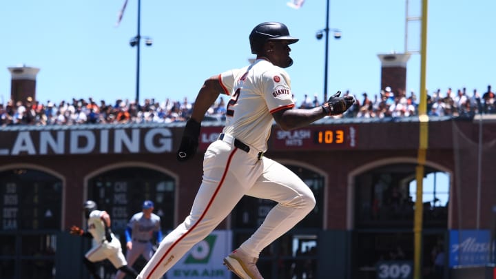 San Francisco Giants designated hitter Jorge Soler (2) runs home after a sacrifice fly for a run against the Los Angeles Dodgers during the first inning at Oracle Park on June 30.