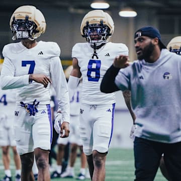 Ephesians Prysock (7) and Tacario Davis (8) are usually together at practice and in games. 