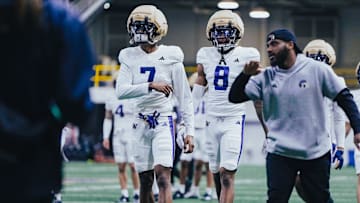 Ephesians Prysock and Tacario Davis usually together at practice. 