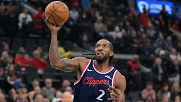 Oct 24, 2025; Inglewood, California, USA; Los Angeles Clippers forward Kawhi Leonard (2) stole the ball from Phoenix Suns guard Collin Gillespie (12) and went down court for a basket in the first half at Intuit Dome. Mandatory Credit: Jayne Kamin-Oncea-Imagn Images