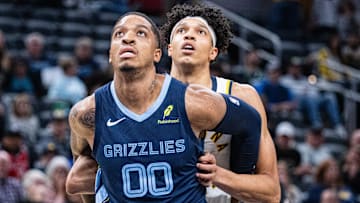 Oct 14, 2024; Indianapolis, Indiana, USA; Memphis Grizzlies forward Armando Bacot (00) boxes out Indiana Pacers forward Enrique Freeman (8) in the second half at Gainbridge Fieldhouse. Mandatory Credit: Trevor Ruszkowski-Imagn Images