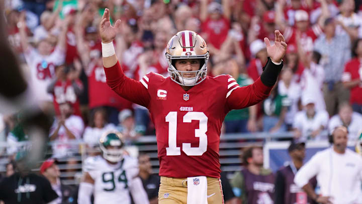 Sep 9, 2024; Santa Clara, California, USA; San Francisco 49ers quarterback Brock Purdy (13) celebrates a touchdown during the second quarter against the New York Jets at Levi's Stadium. Mandatory Credit: David Gonzales-Imagn Images