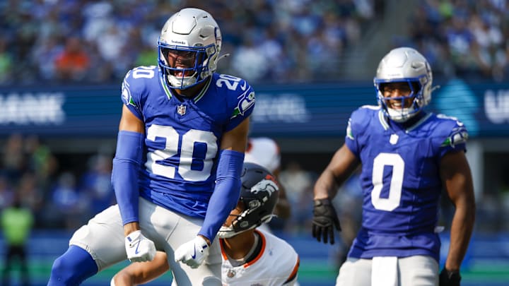 Sep 8, 2024; Seattle, Washington, USA; Seattle Seahawks safety Julian Love (20) celebrates after making a tackle against the Denver Broncos during the third quarter at Lumen Field. 