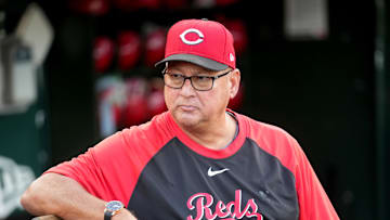 Cincinnati Reds manager Terry Francona (77) sits in the dugout