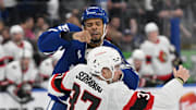 Sep 22, 2024; Toronto, Ontario, CAN;  Toronto Maple Leafs forward Ryan Reaves (75) fights with Ottawa Senators defenseman Donovan Sebrango (37) in the second period at Scotiabank Arena. Mandatory Credit: Dan Hamilton-Imagn Images