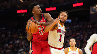 Oct 29, 2024; San Francisco, California, USA; New Orleans Pelicans center Yves Missi (21) holds onto a rebound next to Golden State Warriors forward Kyle Anderson (1) in the third quarter at the Chase Center.
