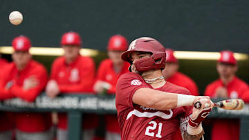 Feb 14, 2025; Tuscaloosa, AL, USA; Brennen Norton takes a swing during Alabama baseball’s opening day at Sewell-Thomas Stadium against Bradley. The Crimson Tide defeated Bradley 10-6.