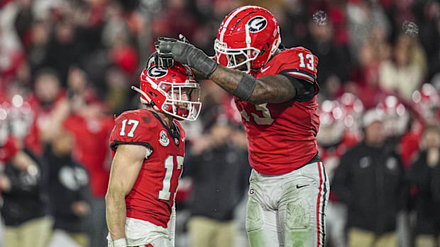 Georgia Bulldogs defensive back Dan Jackson reacts with defensive lineman Mykel Williams. Georgia Bulldogs defensive back Dan Jackson reacts with defensive lineman Mykel Williams.
