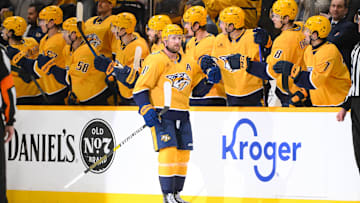 Apr 8, 2025; Nashville, Tennessee, USA; Nashville Predators center Steven Stamkos (91) celebrates his goal with his teammates  against the New York Islanders  during the second period at Bridgestone Arena. Mandatory Credit: Steve Roberts-Imagn Images