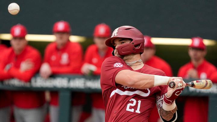 Feb 14, 2025; Tuscaloosa, AL, USA; Brennen Norton takes a swing during Alabama baseball’s opening day at Sewell-Thomas Stadium against Bradley. The Crimson Tide defeated Bradley 10-6.