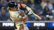 Apr 22, 2025; Minneapolis, Minnesota, USA; Minnesota Twins designated hitter Luke Keaschall (15) hits a single against the Chicago White Sox in the fifth inning at Target Field.