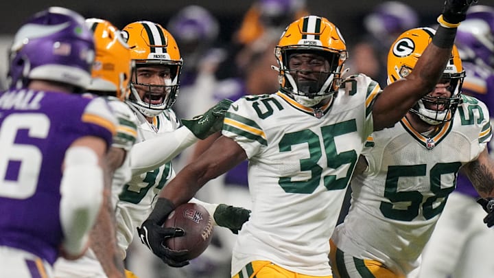 Green Bay Packers cornerback Corey Ballentine (35) celebrates his interception during the first quarter of their game Sunday, December 31, 2023 at U.S. Bank Stadium in Minneapolis, Minnesota. The Green Bay Packers beat the Minnesota Vikings 33-10.