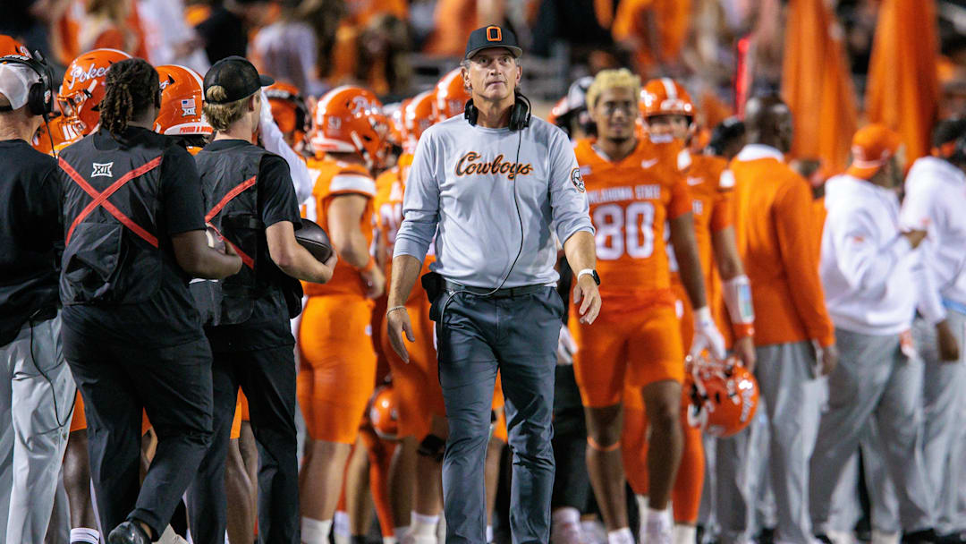 Oct 18, 2025; Stillwater, Oklahoma, USA; Oklahoma State Cowboys interim head coach Doug Meacham on the side lines during the second half against the Cincinnati Bearcats at Boone Pickens Stadium. Mandatory Credit: William Purnell-Imagn Images