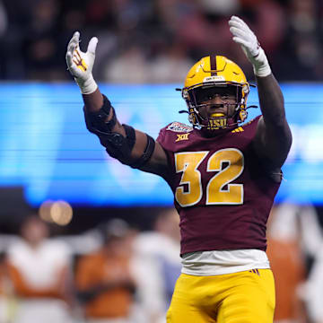 Jan 1, 2025; Atlanta, GA, USA; Arizona State Sun Devils defensive lineman Prince Dorbah (32) fires up the crowd against the Texas Longhorns in the fourth quarter at Mercedes-Benz Stadium. Mandatory Credit: Brett Davis-Imagn Images