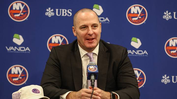 Nov 22, 2025; Elmont, New York, USA; New York Islanders General Manager Mathieu Darche speaks with fans at a pre-game event prior to the game against the St. Louis Blues at UBS Arena. Mandatory Credit: Wendell Cruz-Imagn Images