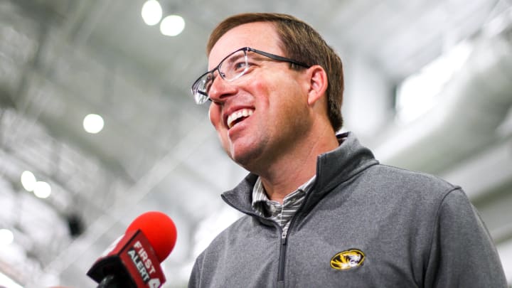 Missouri Tigers head coach Eliah Drinkwitz laughs during an interview post press conference on April 26, 2024 inside Stephens Indoor Facility in Columbia, Mo.