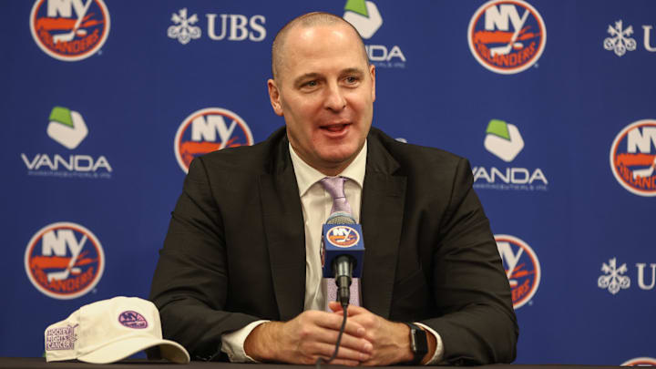 Nov 22, 2025; Elmont, New York, USA; New York Islanders General Manager Mathieu Darche speaks with fans at a pre-game event prior to the game against the St. Louis Blues at UBS Arena. Mandatory Credit: Wendell Cruz-Imagn Images